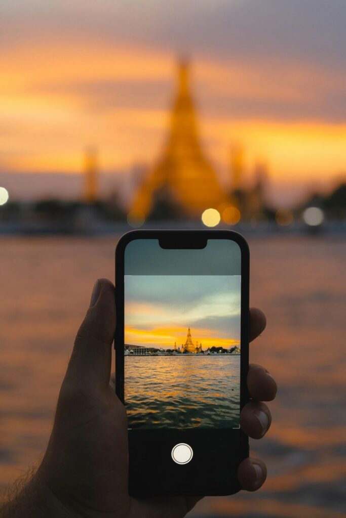 Smartphone screen of video of Wat Arun temple in Bangkok