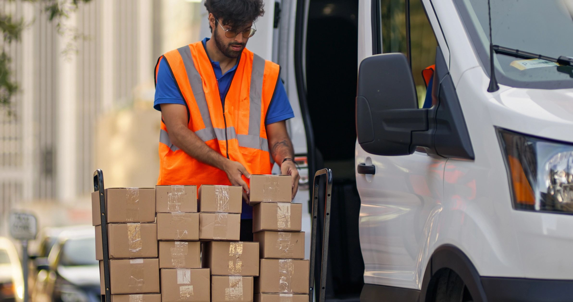 Delivery professional loading packages for an online technology order